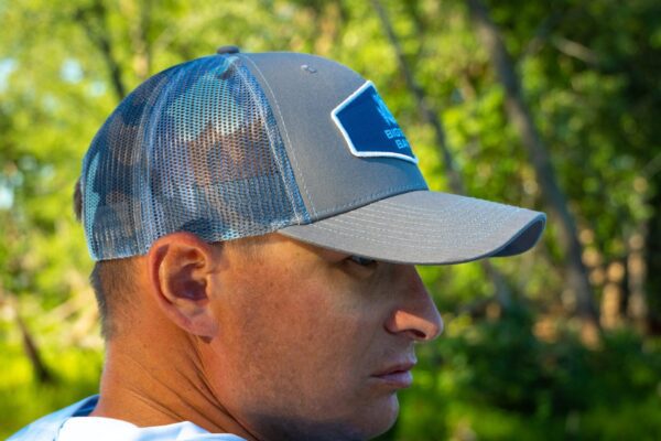 side image of blue camo hat